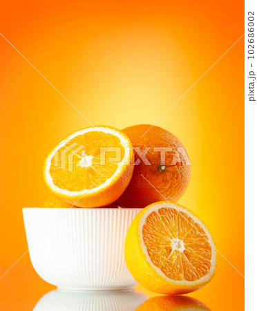 Fresh orange fruits 102686002