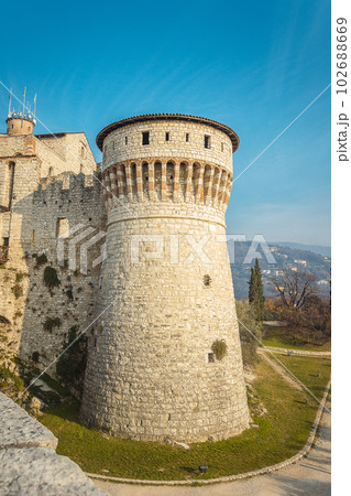 View of the Observation tower from the lower tier of the castle of Brescia city 102688669