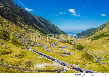 Summer sunday traffic jam on the mountain road Transfagarasan Summer sunday traffic jam on the mountain road Transfagarasan 102689803
