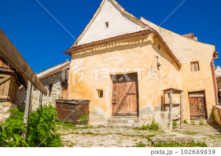 Inside courtyard and old houses of The Rasnov Citadel Inside courtyard and old houses of The Rasnov Citadel 102689839