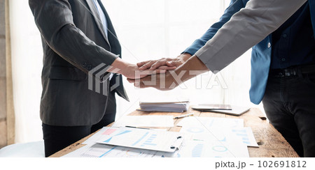 Business teamwork join hands together. group of young people putting their hands. Teamwork Join Hands Support Together Concept. Business teamwork join hands together. group of young people putting their hands. Teamwork Join Hands Support Together Concept. 102691812