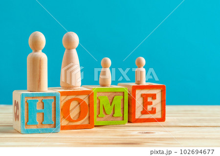 Wooden little family toys. House purchase, sale, rent concept 102694677