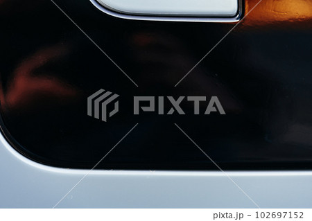 Detail of metal fender of a luxury car 102697152