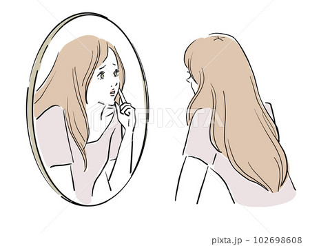 鏡を覗き込むロングヘアの女性 鏡を覗き込むロングヘアの女性 102698608