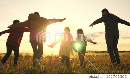 child mother father running sunset. happy family sunny run., child run healthy lifestyle in park at sunset, family nature, family children run park outdoors, children dream, silhouette running people child mother father running sunset. happy family sunny run., child run healthy lifestyle in park at sunset, family nature, family children run park outdoors, children dream, silhouette running people 102701308