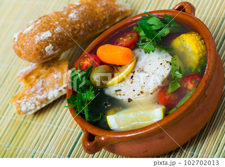 Fisherman's broth cooked with boiled pollock, carrots, corn and greens 102702013