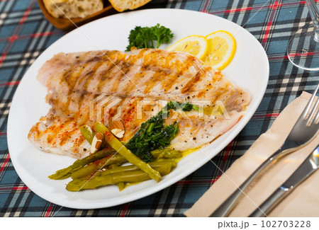 Baked ocean perch fillet Baked ocean perch fillet 102703228