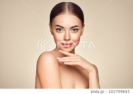 Portrait beautiful young woman with clean fresh skin Portrait beautiful young woman with clean fresh skin 102709683