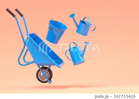 Garden wheelbarrow with garden tools like water can, rake and bucket on orange 102713426