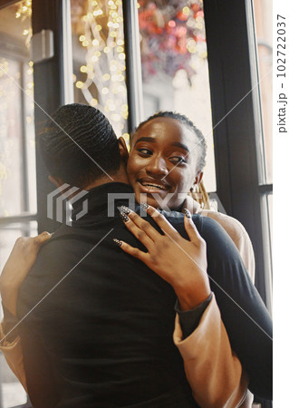 Two young people in cafe. African couple enjoying the time spending with each other. 102722037