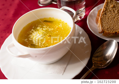 Soviet soup with pickles and barley. Leningrad rassolnik Soviet soup with pickles and barley. Leningrad rassolnik 102723200