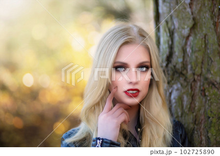 Portrait of sexy long hair girl with red lips 102725890