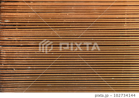 Copper wire background. Thongs made of copper wire. Copper wire background. Thongs made of copper wire. 102734144