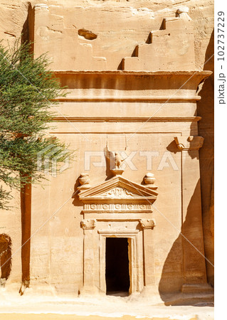 Carved ornamented entrance to the tomb at Jabal al banat complex, Hegra, Al Ula, Saudi Arabia Carved ornamented entrance to the tomb at Jabal al banat complex, Hegra, Al Ula, Saudi Arabia 102737229