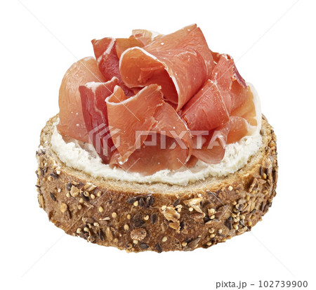 Italian prosciutto crudo bruschetta isolated on white background Italian prosciutto crudo bruschetta isolated on white background 102739900