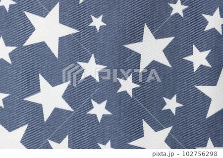 Denim fabric with white different size stars as background 102756298