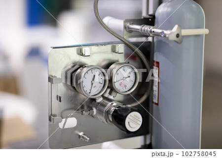 gas cylinder with valve and pressure gauges 102758045