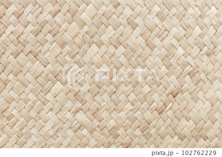 Pattern of reed weaving mat with vintage style for background and design art work. Pattern of reed weaving mat with vintage style for background and design art work. 102762229