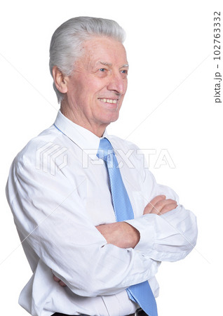 close up portrait of senior businessman in formal wear posing close up portrait of senior businessman in formal wear posing 102763332