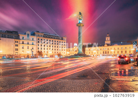 Tbilisi, Georgia, Eurasia. Amazing Altered Violet Sky Gradient Above Liberty Monument Depicting St George Slaying The Dragon And Tbilisi City Hall In Freedom Square In City Center. Travel To Georgia 102763919