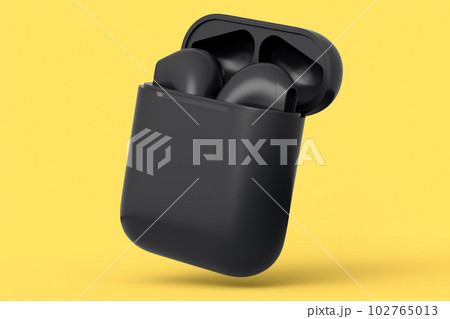 Wireless bluetooth headphones in case isolated on yellow monochrome background Wireless bluetooth headphones in case isolated on yellow monochrome background 102765013