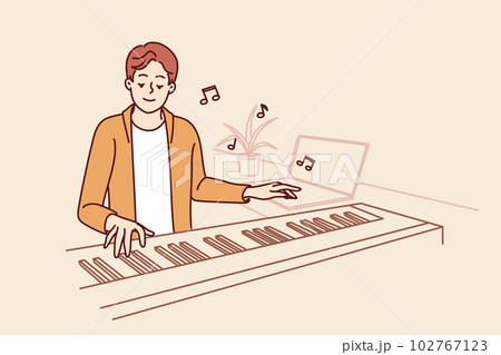 Man plays synthesizer coming up with soundtrack for new movie or tune for popular music album 102767123