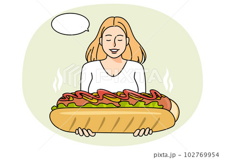 Smiling woman enjoy huge hot dog 102769954
