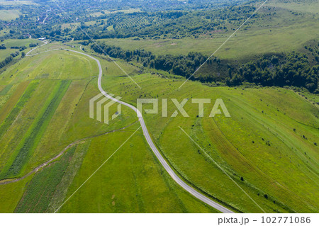 Above view of countryside road, aerial view Above view of countryside road, aerial view 102771086