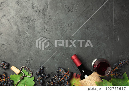Wine composition on dark rustic background copy space Wine composition on dark rustic background copy space 102775617