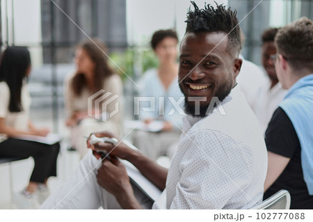 Group of Multi Ethnic Corporate People Interacting with the Speaker 102777088