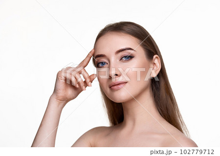woman with perfect skin check the line of eyebrows and eyes without wrinkles 102779712