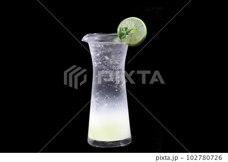 Lemon Juice on black background,  selective focus, soft focus. 102780726