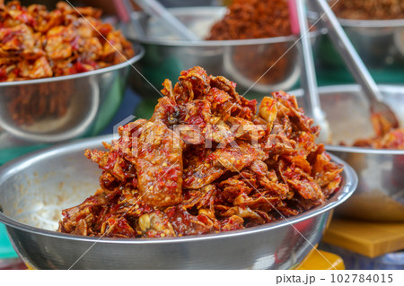 Closeup of deep fried small crabs - Traditional vietnamese cuisine in Dam market, Nha Trang city Closeup of deep fried small crabs - Traditional vietnamese cuisine in Dam market, Nha Trang city 102784015