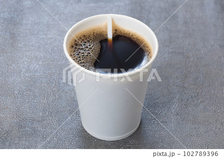 coffee in a white cardboard cup. Concept coffee in a white cardboard cup. Concept 102789396