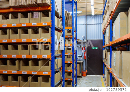 High racks in the warehouse of goods. High racks in the warehouse of goods. 102789572
