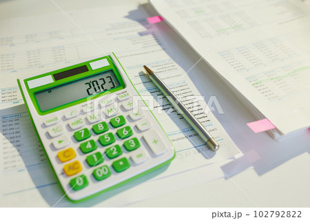 tax time. calculator and documents on desk tax time. calculator and documents on desk 102792822