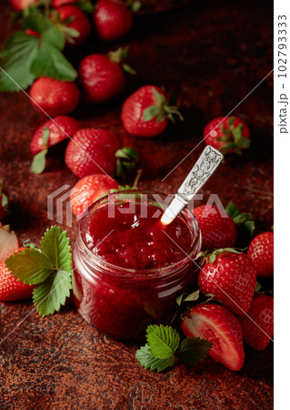 Strawberry jam and fresh berries. 102793333