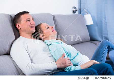 Husband and wife expecting child Husband and wife expecting child 102796625