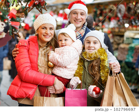Parents and daughters at Christmas fair Parents and daughters at Christmas fair 102796697