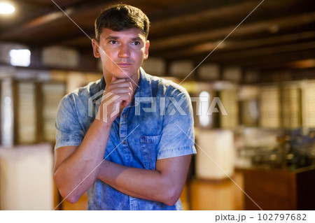 Man looking at exhibit on exposition 102797682