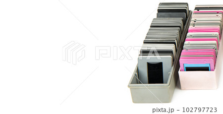 Photo slides in a box isolated on white. Wide photo. There is space for text. 102797723