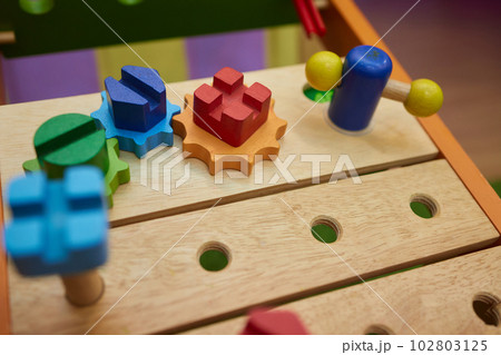 children's educational toy busycube, busyboard in the children's entertainment center. children's educational toy busycube, busyboard in the children's entertainment center. 102803125