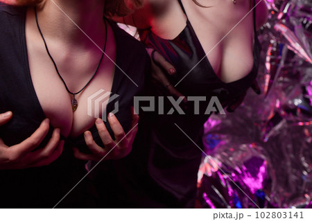Decollete, female breast. Neckline dress and fur collar. Decollete, female breast. Neckline dress and fur collar. 102803141