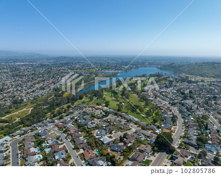 Aerial view of house around Lake Murray reservoir in San Diego, California 102805786