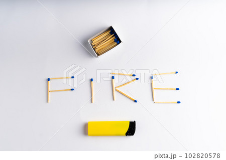 Lighter on white background including matches box, word FIRE Lighter on white background including matches box, word FIRE 102820578