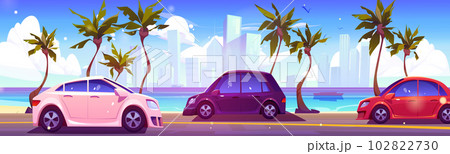 Car drive on road near sea with skyscrapper view Car drive on road near sea with skyscrapper view 102822730