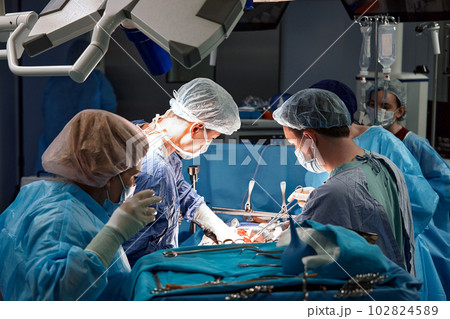 A team of surgeons is fighting for life, for a real operation, for real emotions. The intensive care team is fighting for the life of the patient. A team of surgeons is fighting for life, for a real operation, for real emotions. The intensive care team is fighting for the life of the patient. 102824589