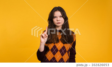 Young woman showing sign of refusal 102826053