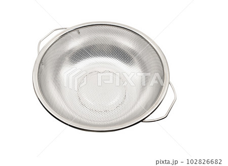 Isolated stainless steel colander on white background. Empty stainless steel colander, 45-angle view from above. 102826682