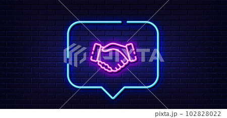Neon light speech bubble. Handshake line icon. Hand gesture sign. Business deal palm symbol. Neon light background. Handshake glow line. Brick wall banner. Vector 102828022